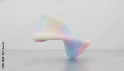 Close-up of an iridescent, translucent sculpture with smooth, curved surfaces on a gray surface against a plain background.