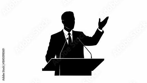 Silhouette of a man giving a speech at a podium.