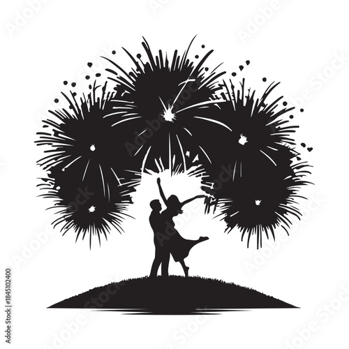 Silhouettes of couple kissing under Silhouette fireworks display romantic celebration event