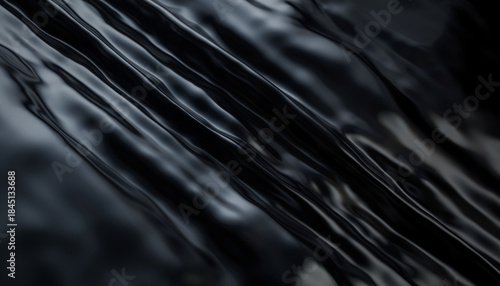 Abstract Black Glossy Texture with Diagonal Folds and Dramatic Light Creating a Dark Minimal Background