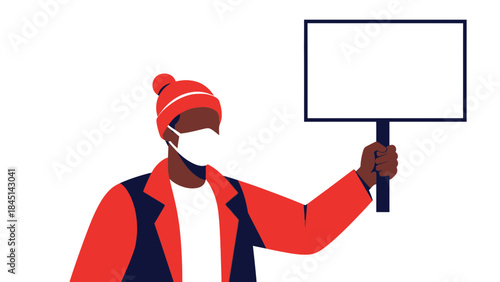 Young adult woman wearing face mask holding blank placard for protest or demonstration, wearing red hat and jacket
