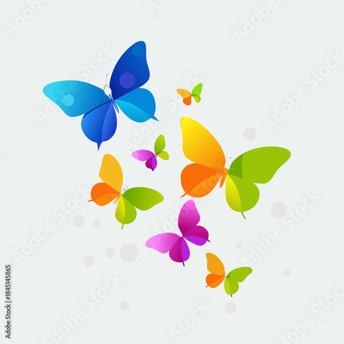 A colorful array of butterflies in flight against a light background