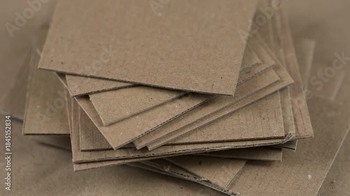 Close-up of stack of brown cardboard pieces