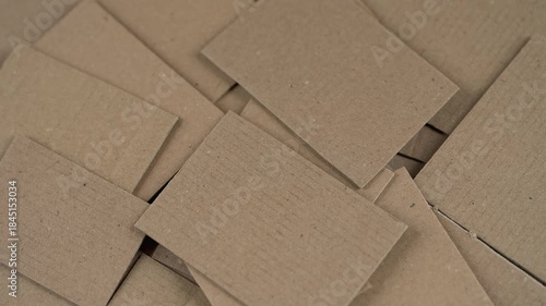 Heap of overlapping brown cardboard pieces. 
