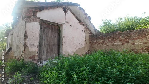 Abandoned Crumbling House with Collapsed Roof. Urban Decay, Post-Apocalyptic Concept