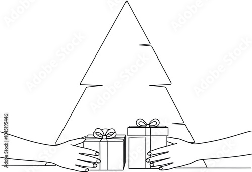 Hands holding gifts in front of christmas tree