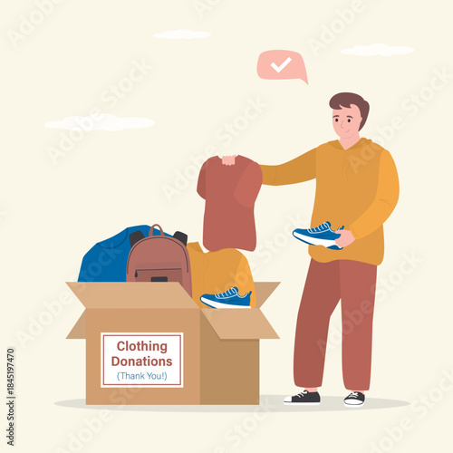 Clothing donation banner. Young man put various old clothes drop into cardboard box. Charity donation concept, second hand things. Support and humanitarian aid.