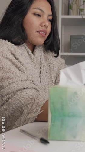 Young latina woman feeling sad during therapy session. Woman having a cold.