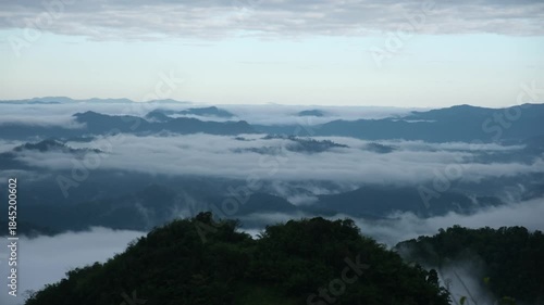 The fog flowing over mountains in the morning