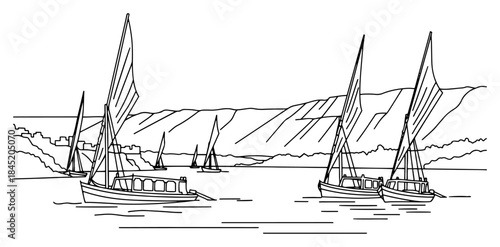 Traditional felucca sailboats sailing on the river nile in egypt landscape outline