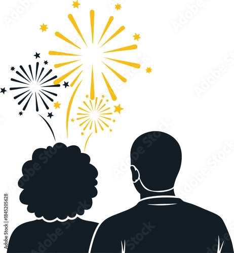 Silhouette of a couple watching fireworks display celebration