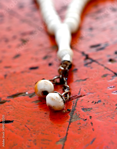 close up of rosary beads, religion theme and concept