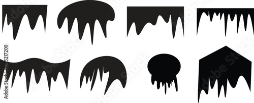 Collection of diverse dark abstract shapes resembling dripping liquid or melting ice on black