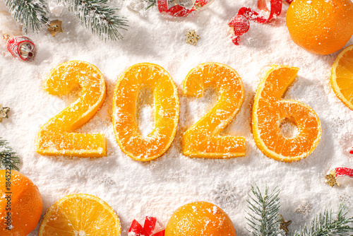Wallpaper Mural 2026 new year numbers made of orange glazed donuts with citrus fruit decoration Torontodigital.ca