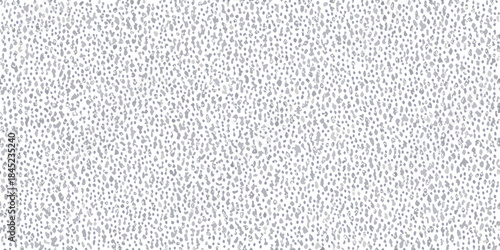 Close up view of a textured light gray and white woven fabric background