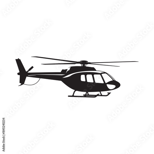 A sleek black silhouette of a helicopter in mid flight clearly visible