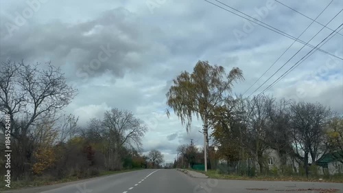 Driving through trees in autumn