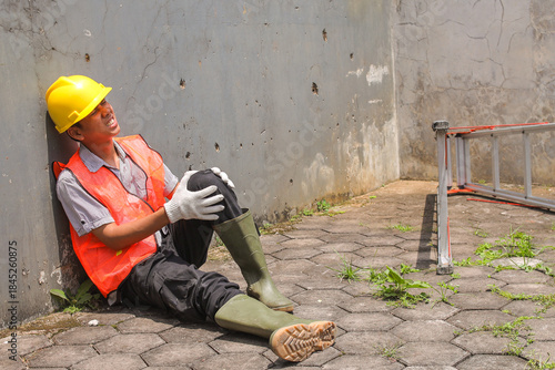 Male Workers Fallen or Sitting in Pain at Worksite