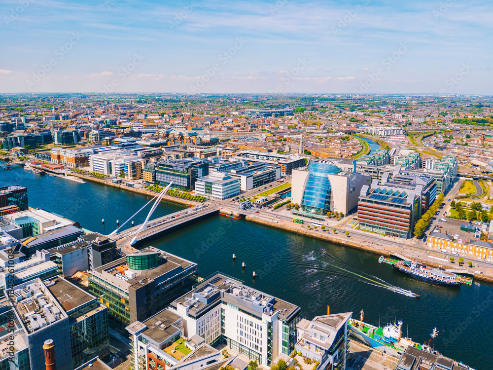 Obraz premium Aerial of Dublin City, Ireland, with Liffey River and Samuel Beckett Bridge