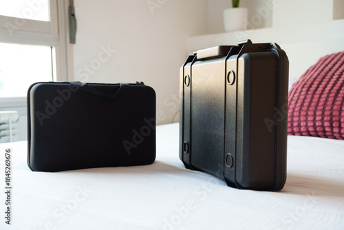 Morning in sunny hotel room, Vintage black trunks placed neatly in bright hotel chamber