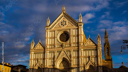 'Santa Croce' (Holy Cross) 19th century marbles facade turn gold at sunset, in Florence historical center