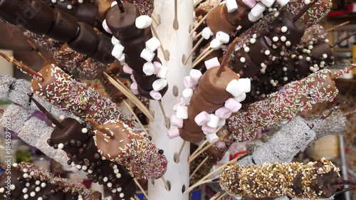 A variety of sweets on sticks at a stall at a Christmas market in France