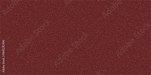 Close-up view of a dark red textured surface with a fine grain pattern.