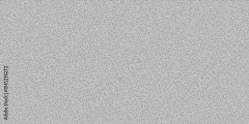 Close-up view of a uniform light grey background with a subtle, fine-grained texture, resembling television static or digital noise.