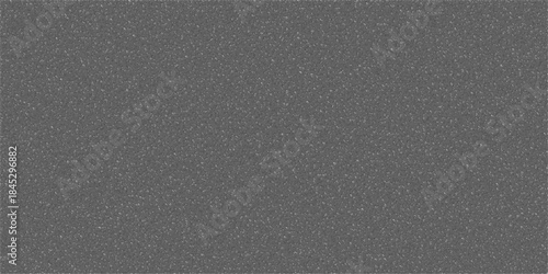 Close-up view of a uniform dark grey background with a subtle, fine grain texture, suitable for abstract designs or overlays.