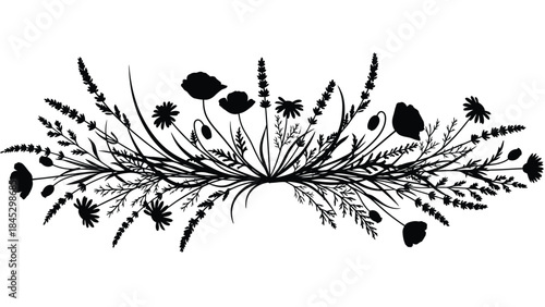 A delicate black and white floral arrangement of wildflowers and grasses