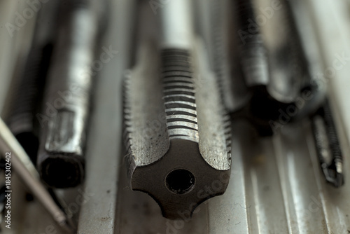 Thread tap four straight flute close up.