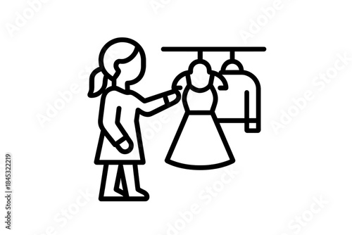 Person choosing a dress from a clothing rack in a retail store or home closet