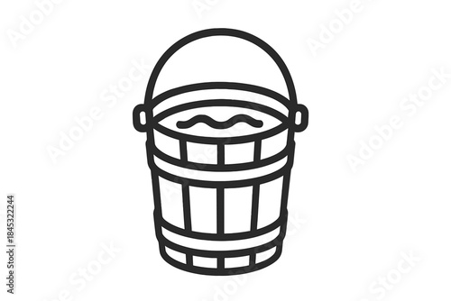 Traditional wooden bucket filled with fresh water for farming and cleaning