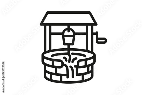 Traditional wooden water well structure with a bucket drawing fresh water source