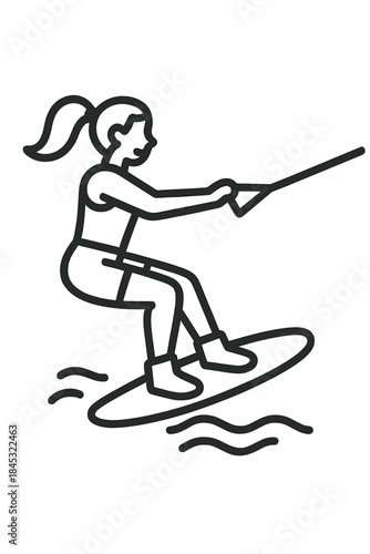 Female athlete wakeboarding on water during summer sport activity