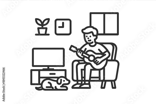 Man playing acoustic guitar in armchair with dog resting on living room floor