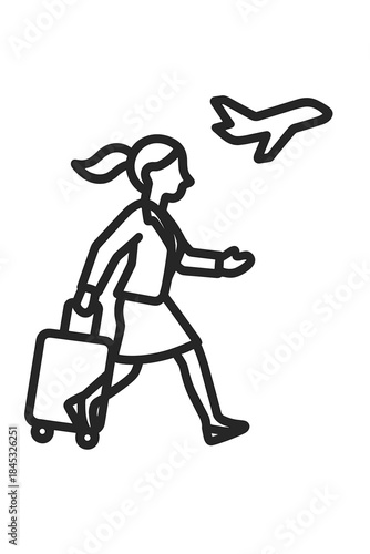 Woman walking quickly with rolling luggage toward an airplane taking off overhead