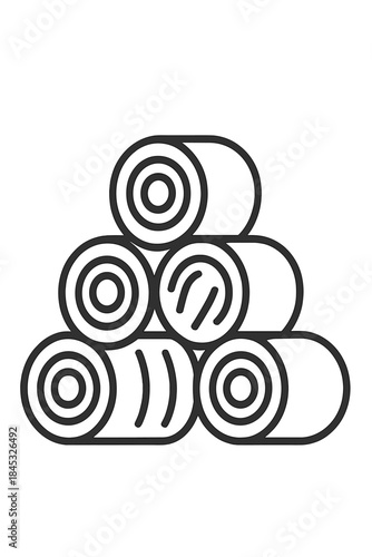 Pyramid stack of rolled hay bales in a field representing farming and harvest