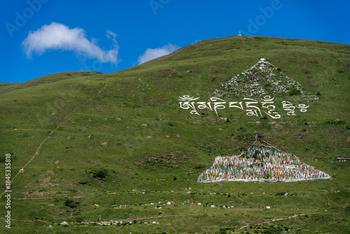 prayer flags on the hillside forming a triangle, Tagong (Lhagang), Garzê Tibetan Autonomous Prefecture, Sichuan,  China