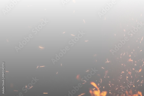 Fotografia Bright fire sparks explode outward in a chaotic pattern