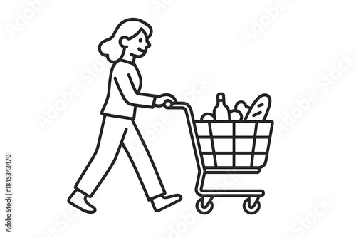 Woman walking and pushing a shopping cart full of groceries at the supermarket aisle