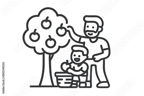 Father and child picking fresh apples from tree into basket