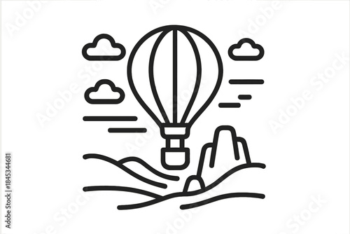 Hot air balloon soaring above stylized desert mountains and clouds