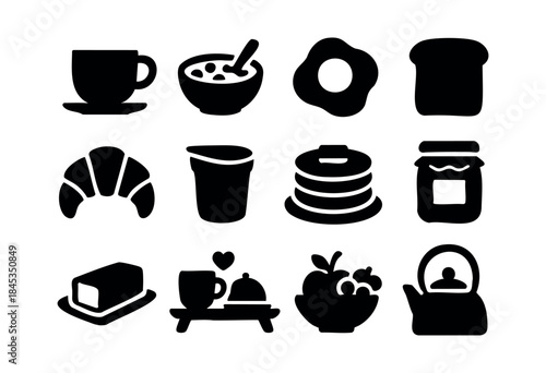 A comprehensive set of black silhouette icons representing various popular breakfast items and concepts, suitable for menus, applications, and web design — stock vector.