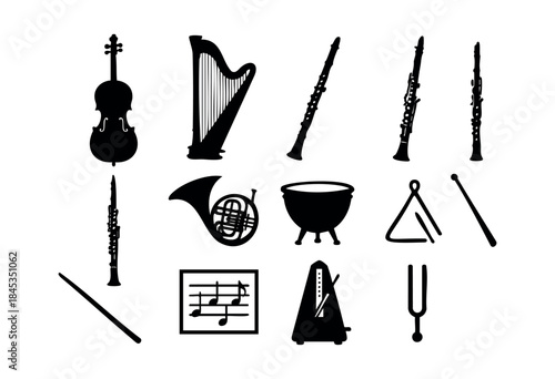 A collection of black silhouettes featuring various orchestral instruments and music-related tools on a white background — stock vector.