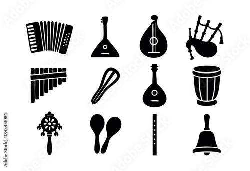 A comprehensive collection of diverse black silhouette icons representing traditional and folk musical instruments from various cultures, isolated on white. — stock vector.