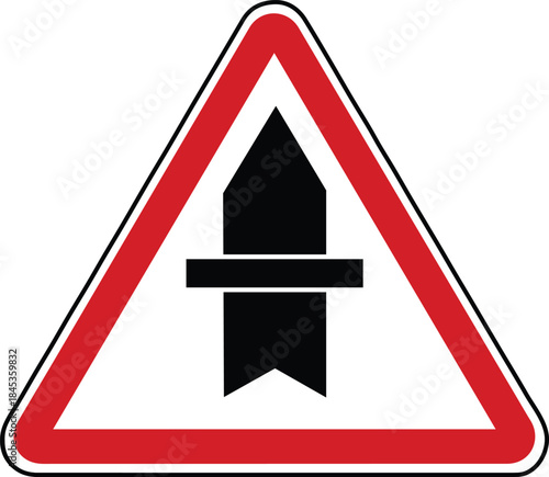 Road sign warning of a narrowing road ahead