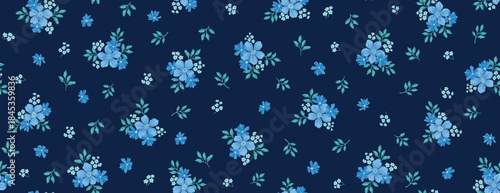Floral liberty pattern with small colorful flowers field on a dark blue background. Repeating ditsy doodle flower meadow background. Vector design for paper, cover, fabric, interior decor and other