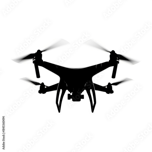 Silhouette of a drone flying with blurred propellers
