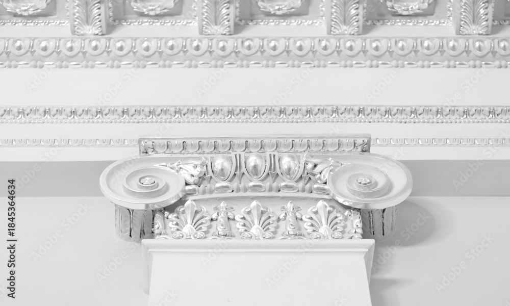 Obraz premium Decorative portico features of an Ionic column showcasing intricate white details